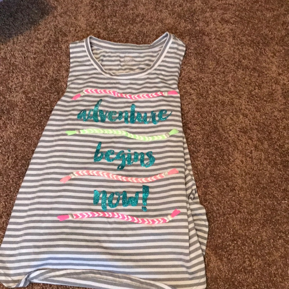 A white and white stripped tank top